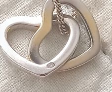 Sterling silver double heart necklace with real diamond accent