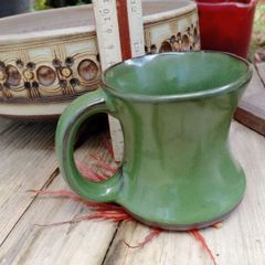 green pottery mug