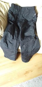 New waterproof wet weather pants, double insulated (motorbike or ski salopettes) Size 44R (54). Never worn. 4x zipped pocket, zipped and velcro legs. Bargain!!!