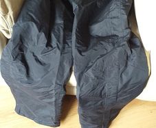 New waterproof wet weather pants, double insulated (motorbike or ski salopettes) Size 44R (54). Never worn. 4x zipped pocket, zipped and velcro legs. Bargain!!!