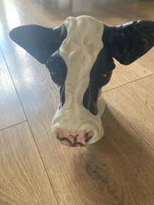 Ceramic cow vase