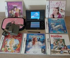 Nintendo ds lite in black with charger and games all in good working order