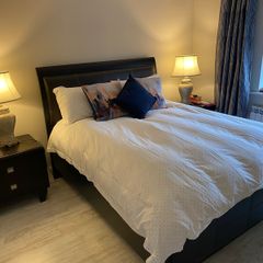 king size bed with matching lockers and lamps