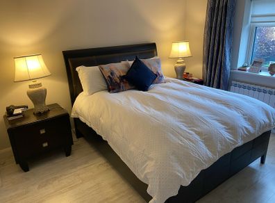 king size bed with matching lockers and lamps