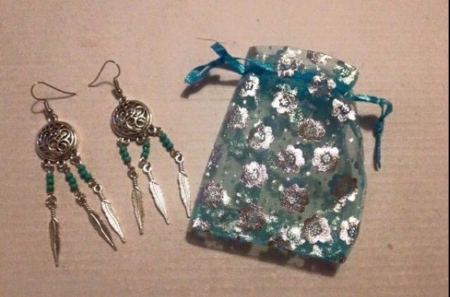 Brand new dreamcatcher earrings with feathers and turquoise beads