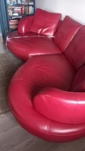 Red Leather curved sofa.. very large!
