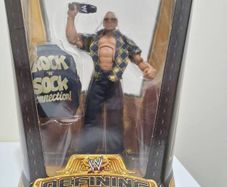 Official WWE Defining Moments The Rock