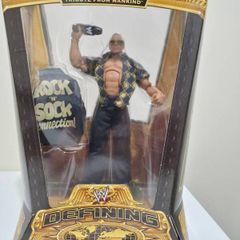 Official WWE Defining Moments The Rock