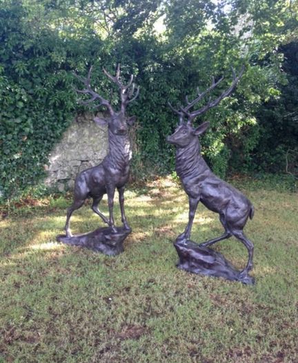 Pair of life size bronze deer statues