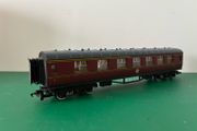 Two OO Gauge Red Passenger Coaches