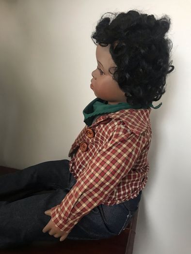 Lifelike doll in cute western clothes
