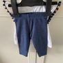 2 piece baby outfit navy leggings white top with neon orange thread detail & navy fringing on capped sleeves Image 2