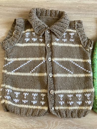 2 hand knitted boys body warmers