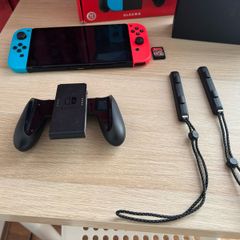 Nintendo Switch OLED (Neon Blue/Red) + Mario Kart 8 Deluxe + Super Mario Bros. W