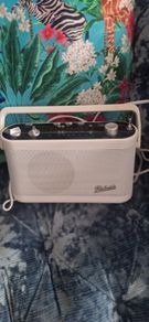 Roberts portable radio, shelfs, grey white and yellow small shelves,Christmas tree skirt childrens desk chair, picture. Single duvet cover new. Small black mirrors. Bundle for 150.00