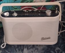 Roberts portable radio, shelfs, grey white and yellow small shelves,Christmas tree skirt childrens desk chair, picture. Single duvet cover new. Small black mirrors. Bundle for 150.00