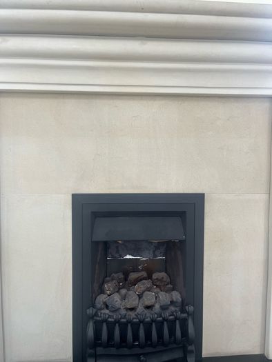 stone fireplace with gas fire