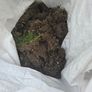 mix of grass sods, soil and stone Image 2