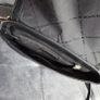 Michael Kors black crossbody bag with adjustable shoulder strap and gold-tone hardware. In great condition, only some colour fading on the logo, as shown in the photos. Image 7