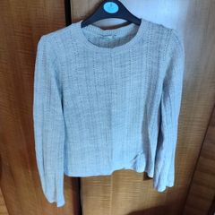 Grey knitwear jumper