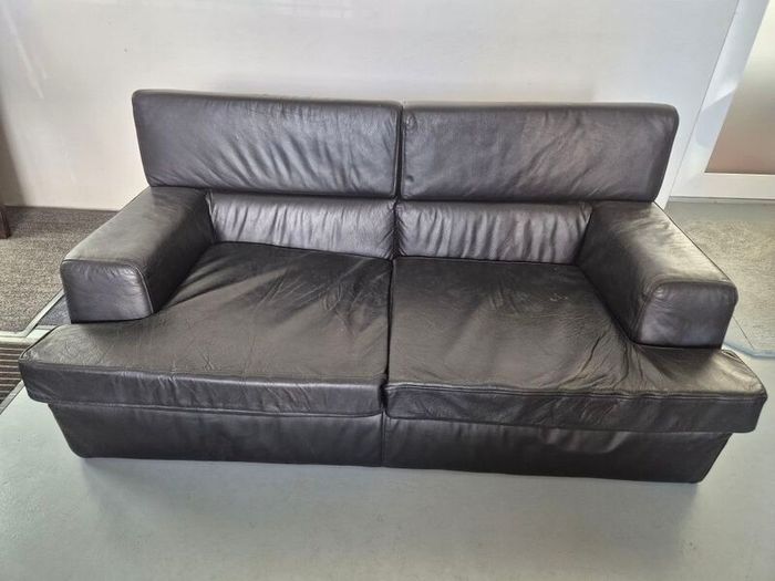 1 contempory leather sofa with arm chair