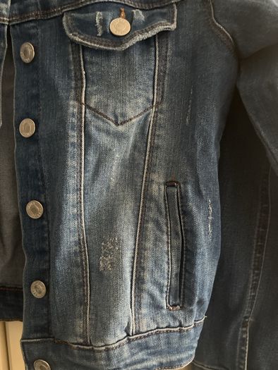 Destressed look denim jacket