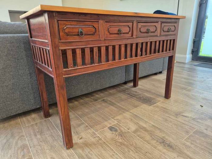 Balinese style wooden hall table with four drawers