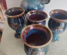 Colm De Ris Pottery blue Jug and 4 blue goblets as set.in very good condition as new.