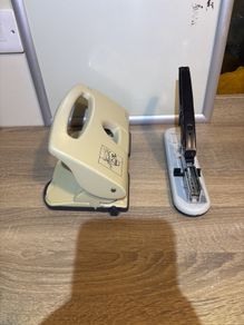 Stationary high grade stationary stapler and whole puncture office grade