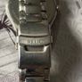 Relic face changing watch with broken watchstrap Image 2