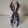 Silk-feel scarf with leopard print and wooden ring Image 3