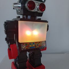 Saturn Robot. The 13" Giant Walking Robot With BIG  SCREEN TV And Light-Up Eyes In MINT Condition. 1980's