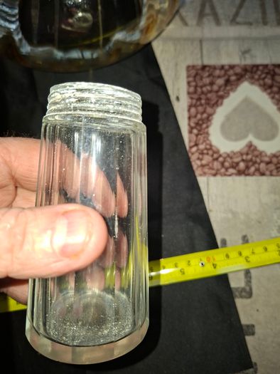 Antique Glass Sugar or Spice Shaker featuring a perforated Silver Plated Lid.