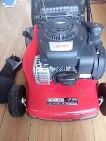 Mount field petrol lawnmower