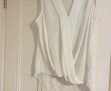 Paraphrase dressy sleeveless top, states size 14 but more like 16