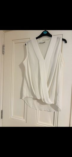 Paraphrase dressy sleeveless top, states size 14 but more like 16