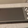 Nintendo switch lite + 64gb SD card + Pokemon mystery dungeon Image 4