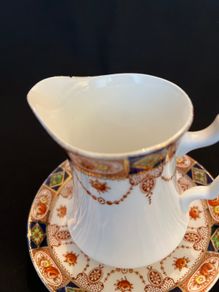 Milk Jug and Saucer