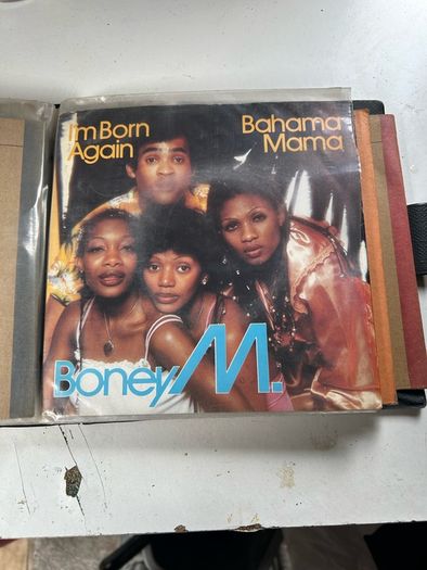 Collection of 45 s in folder .