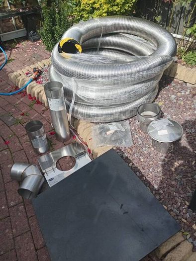 new stove 9m flue,heart ,cowl etc