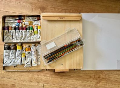 Oil paint color, brushes, frame, wooden box