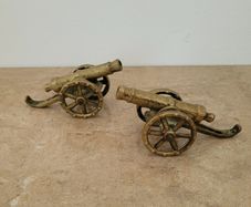 Vintage pair of brass canons