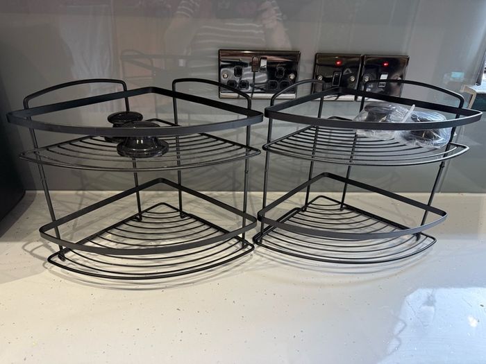 2 black shower caddy's. Brand new never used