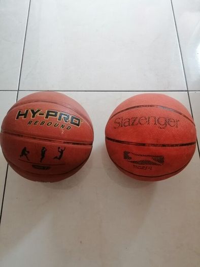 Basketball stand and two basketballs
