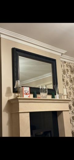 Black rectangle mirror with gold stud detail