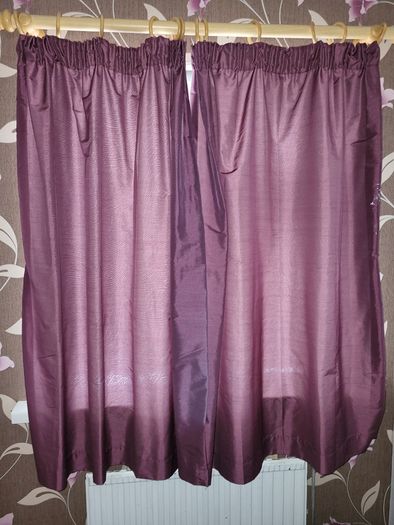 Plum coloured curtains