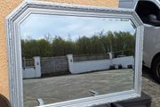 Large silver framed bevelled mirror