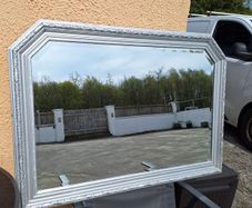 Large silver framed bevelled mirror
