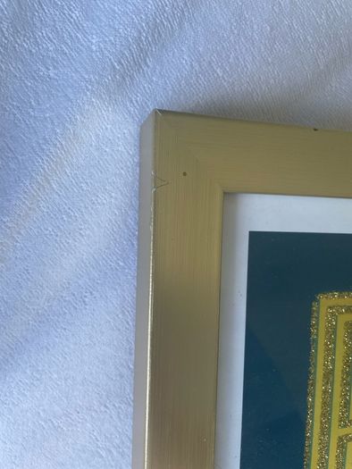 Gold framed bar sign