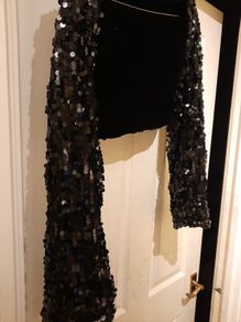 Cherry Chau beautiful black sparkly arm cover up